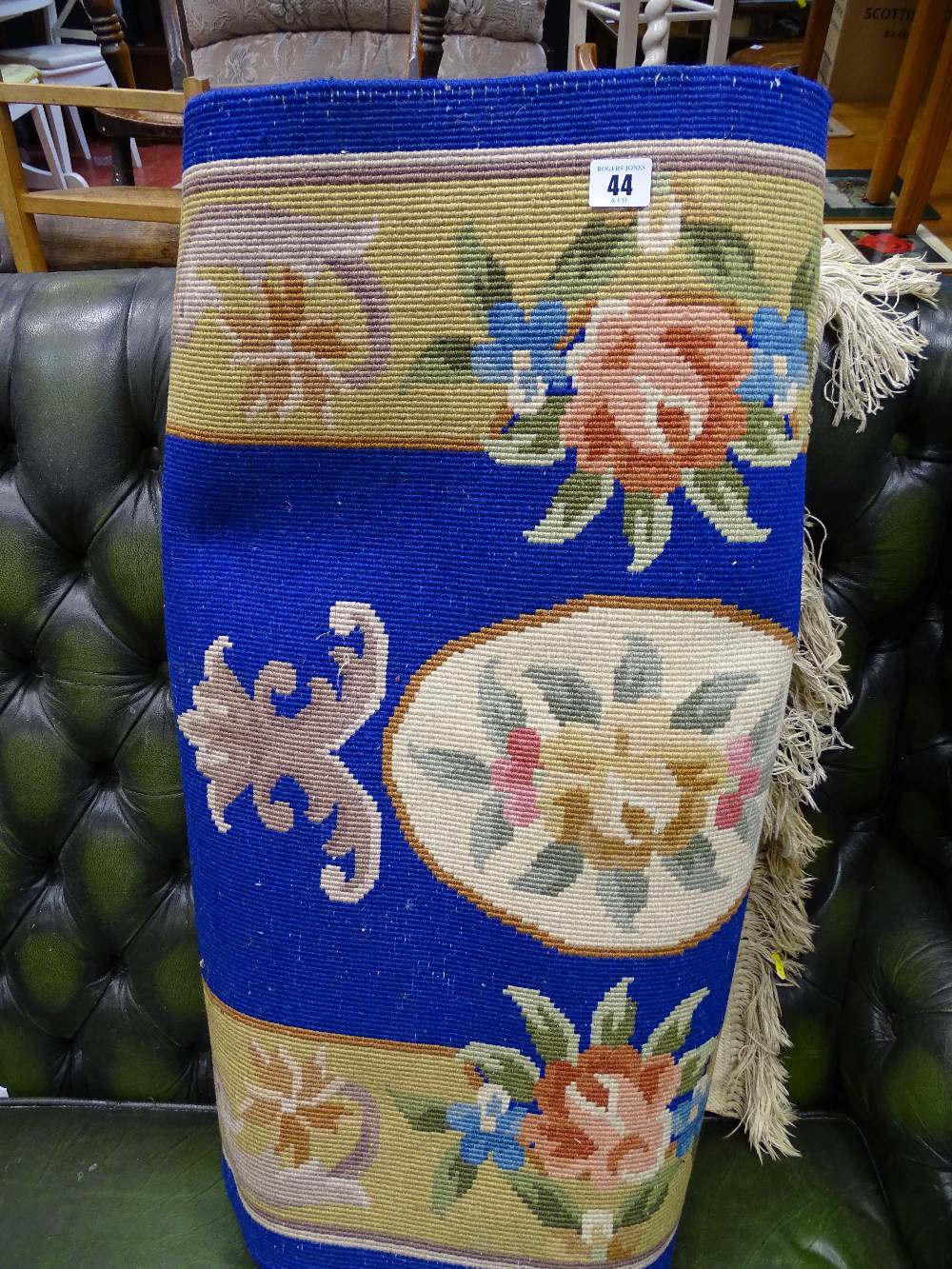 Cobalt blue floral bordered washed rug