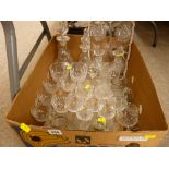 Box of good drinking glassware and a graduated set of two decanters with stoppers etc