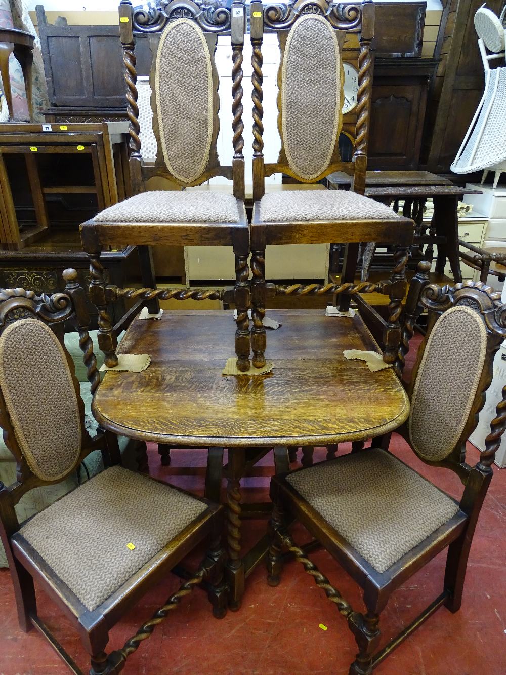 Barley twist gate leg drop leaf table and four barley twist chairs with matching upholstered seats