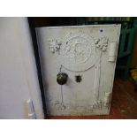 Small white painted safe and key with 'Millers Patent Fire Resisting Stronghold Fast Safe' plaque