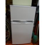 Compact fridge with upper freezer compartment and a Hoover 2100w Spirit upright vacuum cleaner E/T