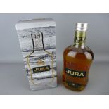 Boxed Jura bottle of ten year old single malt Scotch whisky
