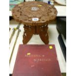 Carved folding stool and a book - 'Beautiful Britain, The Scenery and Splendours of the United