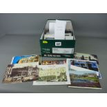 Shoebox of vintage postcards and travel ephemera