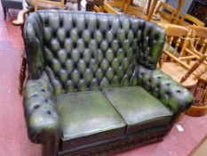 Green leather effect button back Chesterfield settee