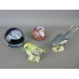Two vintage glass paperweights and two Beswick pottery birds - grey wagtail and a goldcrest