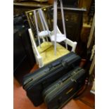 Painted basket weave chair, mirror, painted occasional table and two items of modern luggage