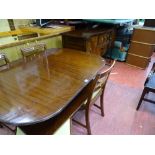 Polished wood single pedestal dining table with six (four plus two) chairs (gifted by vendor) and