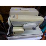 Cased Singer sewing machine