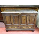 A CIRCA 1820 & LATER OAK MULE CHEST having a two plank top over a peg-joined four panel front with