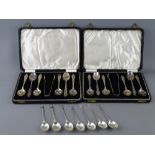 A CASED SET OF SIX SILVER COFFEE SPOONS with sugar tongs, 3.5 troy ozs, Birmingham 1940, a similar