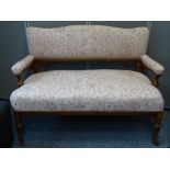 AN ATTRACTIVE 19th CENTURY WALNUT TWO SEATER SETTEE having carved detail and classical style