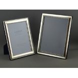 TWO MODERN HALLMARKED SILVER EASEL PHOTOGRAPH FRAMES, both rectangular form, 21.5 x 16 cms,