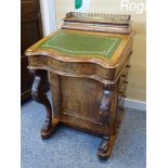 A VICTORIAN WALNUT DAVENPORT, stationery cabinet top with brass three quarter rail and fitted