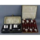 A CASED SILVER CONDIMENT SET and a set of six daffodil decorated silver teaspoons, Birmingham 1932