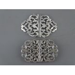 TWO SILVER NURSE'S BUCKLES, Birmingham 1900, maker Samuel M Levi and London 1991 with oak leaf and