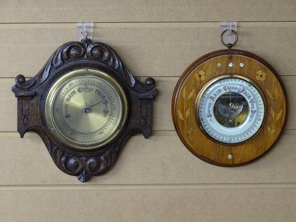 TWO VINTAGE WALL BAROMETERS, an inlaid circular mahogany example with mother of pearl insets, the