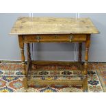 A LATE 17th CENTURY OAK SINGLE DRAWER SIDE TABLE, the three plank pegged top with moulded edge,