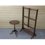 AN EARLY VICTORIAN MAHOGANY FOLDING LINEN RAIL and a piecrust top wine table with attached