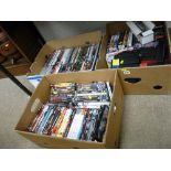 Three boxes with large quantity of DVDs