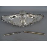 Silver boat shaped ink stand, London 1896 with a silver cased dip pen, 8 troy ozs gross weighable (