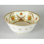 A SWANSEA PORCELAIN SLOP BOWL decorated in pattern number 493 with chrysanthemum mons, dimpled