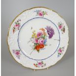 A FINELY DECORATED NANTGARW PORCELAIN PLATE with lobed rim and having a moulded border with C-