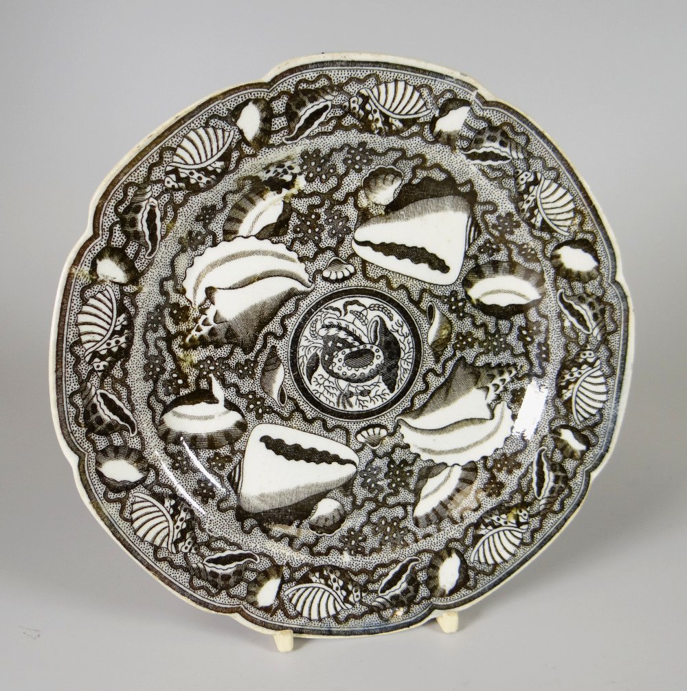 SWANSEA POTTERY TEA PLATE of lobed form and decorated with shell transfer, circa 1800-1810, 18cms