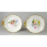 A PAIR OF SWANSEA PORCELAIN SHELL SHAPED DISHES of lobed form, gilded fan handle and gilded rim