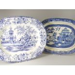 TWO NINETEENTH CENTURY WELSH POTTERY MEAT PLATTERS with blue and white transfer decoration, by