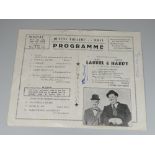AN AUTOGRAPHED LAUREL & HARDY SOUVENIR PROGRAMME FROM 1952 FOR A SHOW AT QUEEN'S THEATRE, RHYL