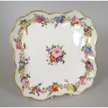 A NANTGARW PORCELAIN SQUARE DISH of rounded and fluted form with dentil gilded rim, decorate with