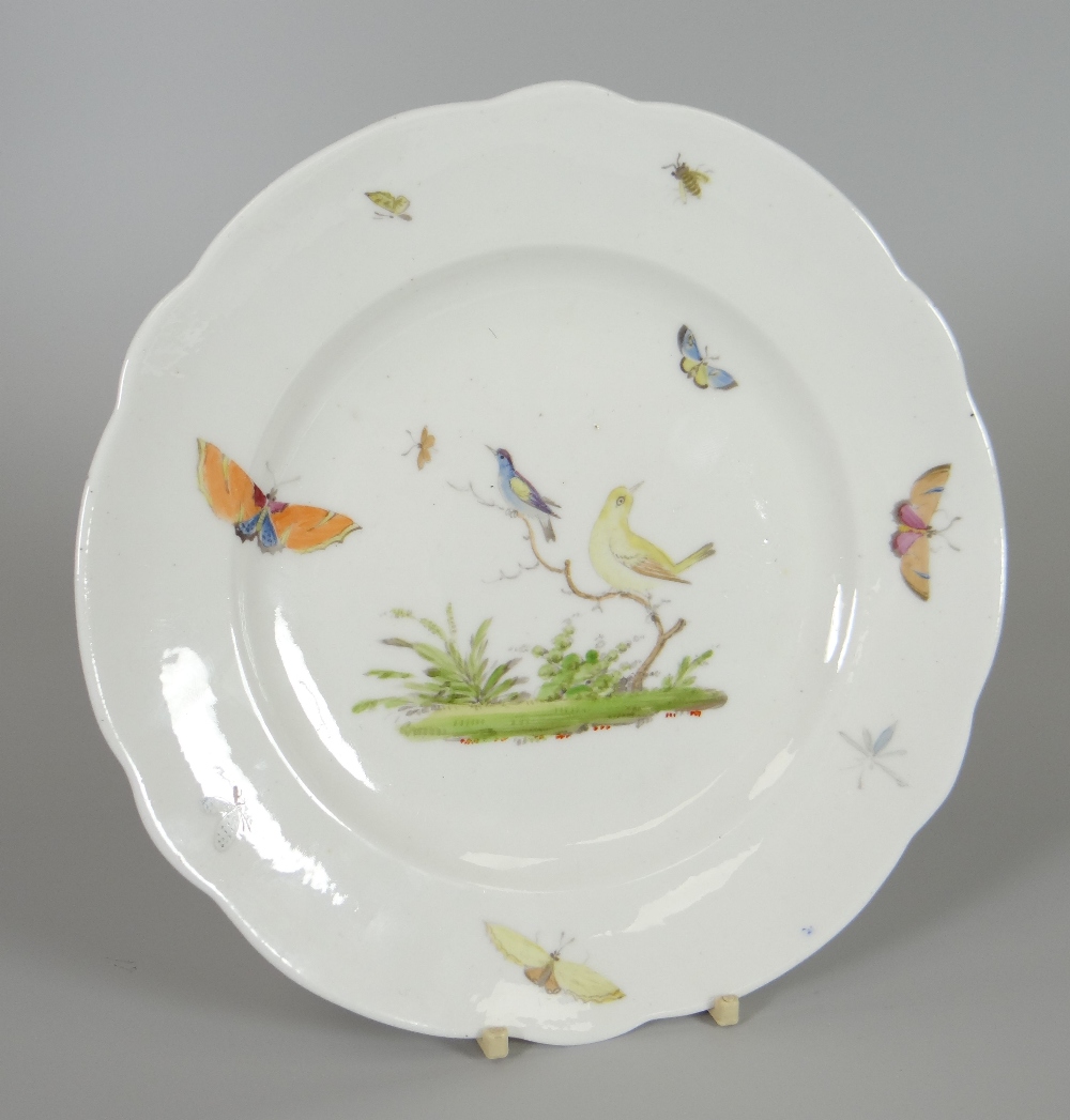 A RARE NANTGARW PORCELAIN PLATE of lobed form, painted probably by Thomas Pardoe or son, with two
