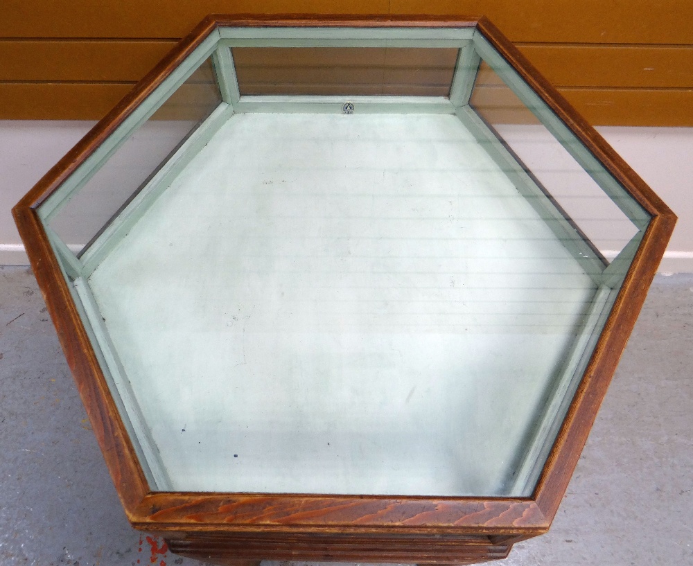 A BRYNMAWR PITCH-PINE SPECIMEN TABLE OF HEXAGONAL FORM with raised top having glass panes to each - Image 3 of 10