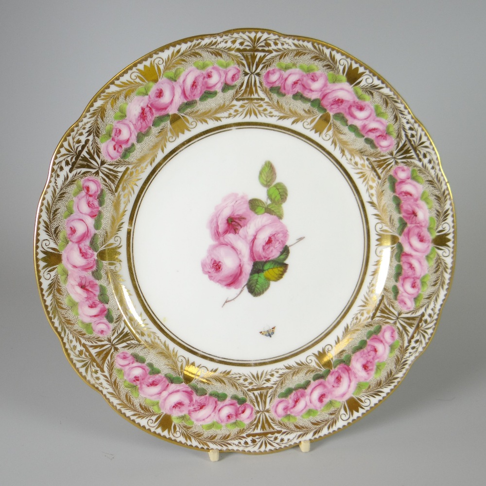 A NANTGARW PORCELAIN PLATE of lobed form, London decorated in The Three Rose pattern with three