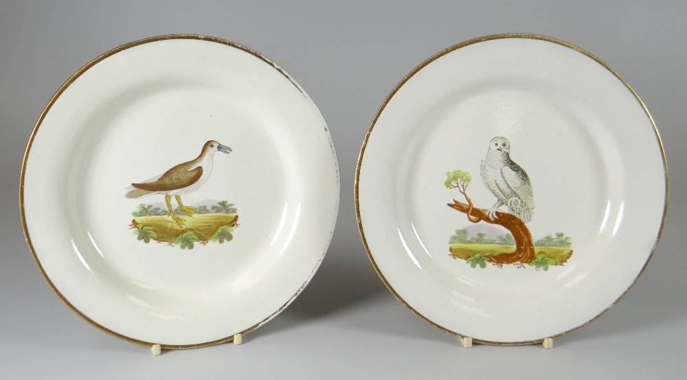 PAIR OF NINETEENTH CENTURY SWANSEA CAMBRIAN POTTERY CREAMWARE PLATES of circular plain non-moulded