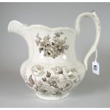 A SWANSEA POTTERY JUG WITH FLORAL TRANSFER having a moulded body with sepia transfer mark 'Opaque