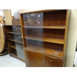 A polished bookcase with cupboard base and a sliding door vintage bookcase Condition reports