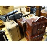 Two items of vintage luggage, a vintage table-top cabinet and a pair of riding boots Condition