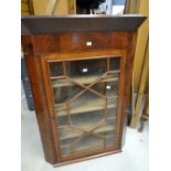 A nineteenth century mahogany single-glazed door hanging corner cabinet, 80cms wide Condition