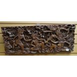 Mid-twentieth century single-block Indonesian deep carved wood panel of dancing figures, 18 x