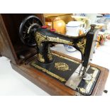 Vintage Singer sewing machine with original handled hood Condition reports provided on request by