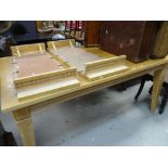 A modern lightwood extending dining table, 107cms wide x 162cms long Condition reports provided on
