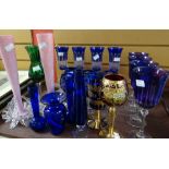 A tray of blue and other coloured drinking glasses ETC Condition reports provided on request by