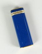 A Cartier blue enamel and white / yellow metal decorated cigarette lighter No.70560 Condition