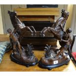 A pair of metallic Marly-type horses and warrior sculptures Condition reports provided on request by