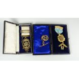 A cased 15ct yellow gold Masonic medallion and ribbon inscribed for Forest Lodge No.2606, a 9ct