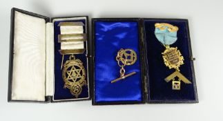 A cased 15ct yellow gold Masonic medallion and ribbon inscribed for Forest Lodge No.2606, a 9ct