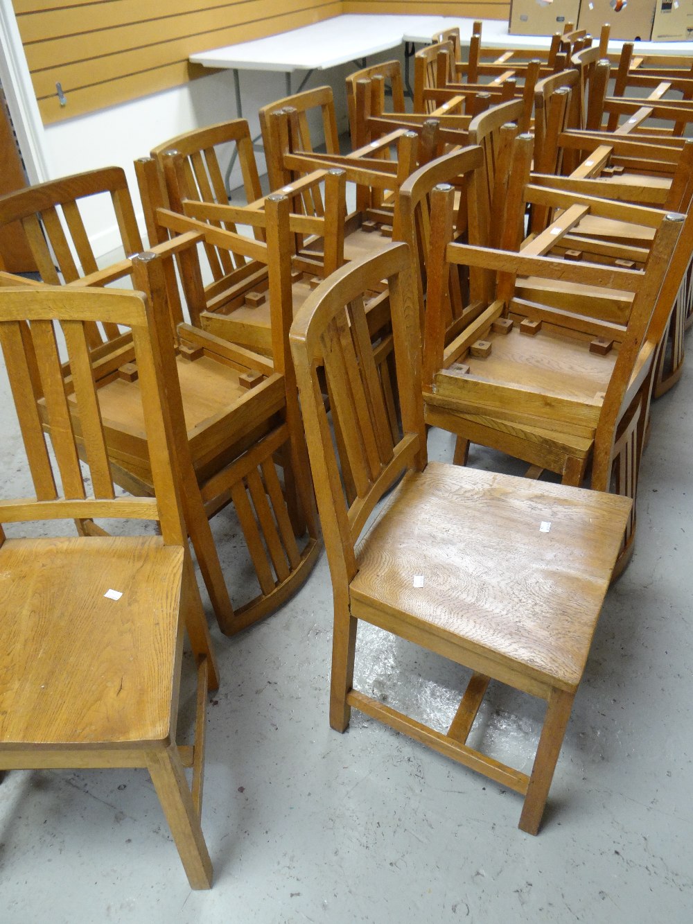 A set of twenty-six Brynmawr oak chairs of simple form with three vertical rail backs, some - Image 2 of 13