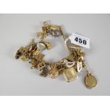 9ct gold ladies charm bracelet with over thirty charms, mostly 9ct gold, 58.6grams overall including